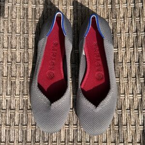 Rothy's Charcoal Knit Slip-On with Red Insole and Blue Stitching